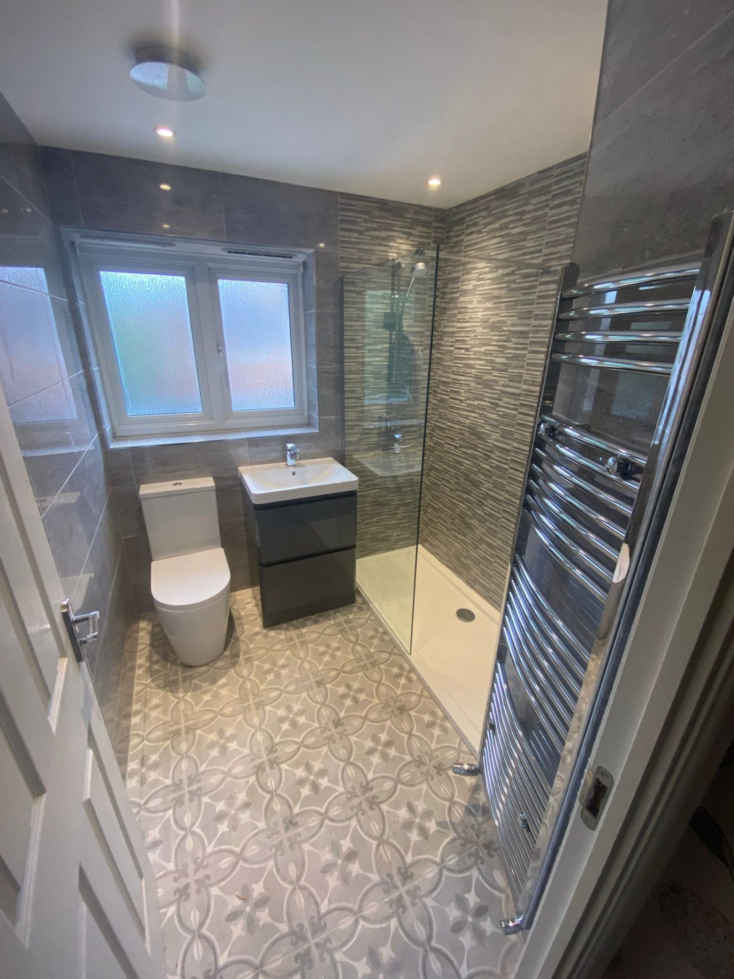 Contemporary Shower Room with Patterned Floor by DPS Plumbing & Bathrooms in Bramhall, Stockport