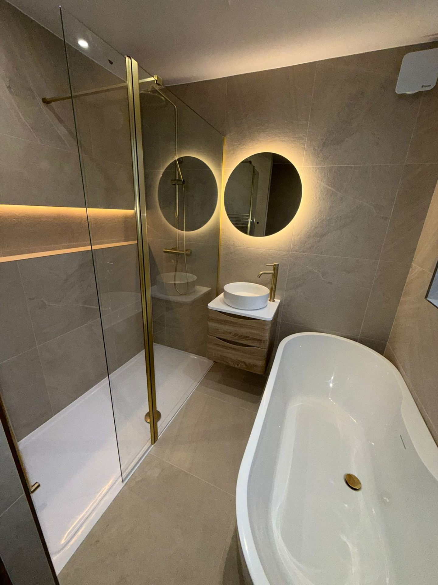 Luxury Bathroom with Gold Fixtures & Freestanding Bath by DPS Plumbing & Bathrooms in Worsley, Salford