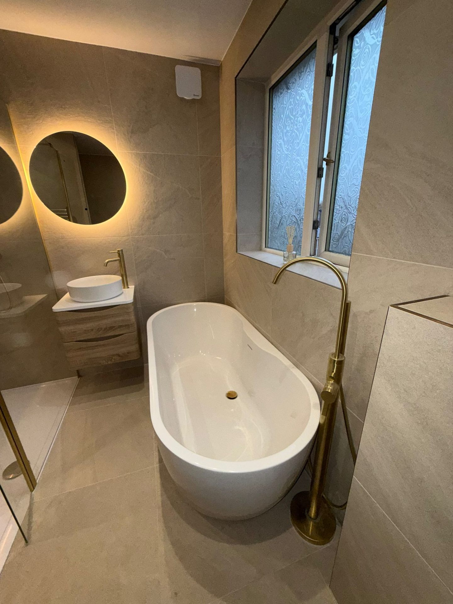 Freestanding Bath Suite with Gold Tap & LED Mirror by DPS Plumbing & Bathrooms in Didsbury, Manchester